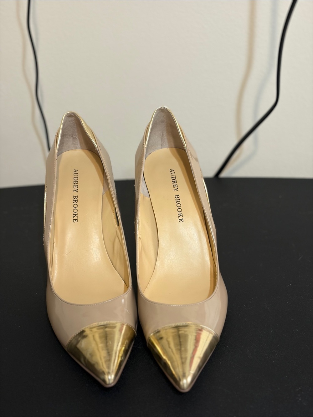 Audrey Brooke Nude Patent Pumps with Gold Cap Toe Accents